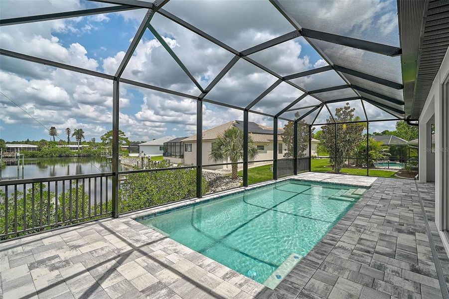 Exterior details and patio area of a home in , North Port (Image 40).