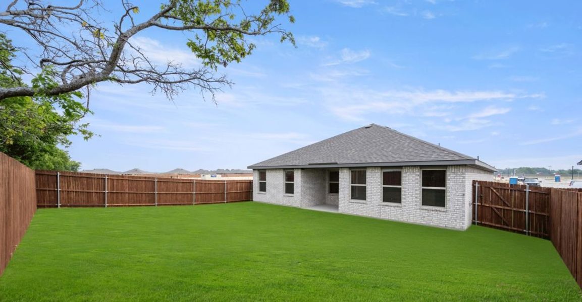Representative exterior photo of a completed home built from the Boston by Impression Homes in Baker Farms, Cleburne, TX (Image 25).
