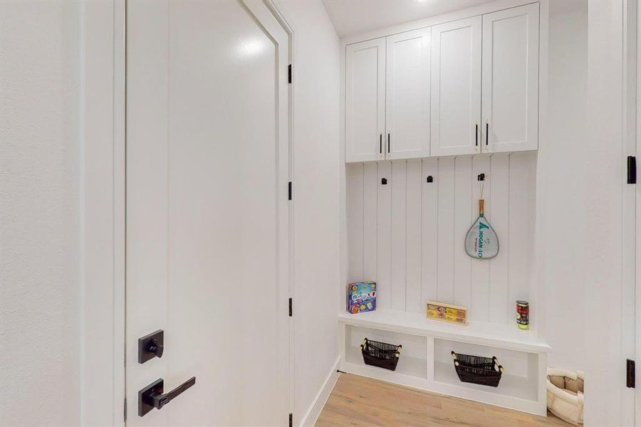 Mudroom featuring light hardwood / wood-style floors