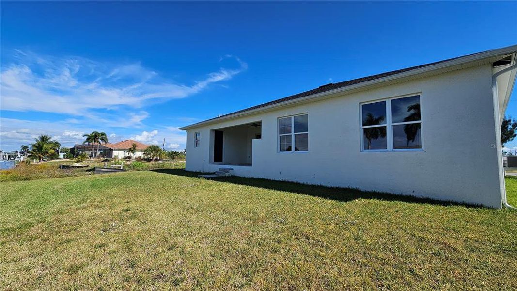 Exterior details and patio area of a home in , Port Charlotte (Image 11).