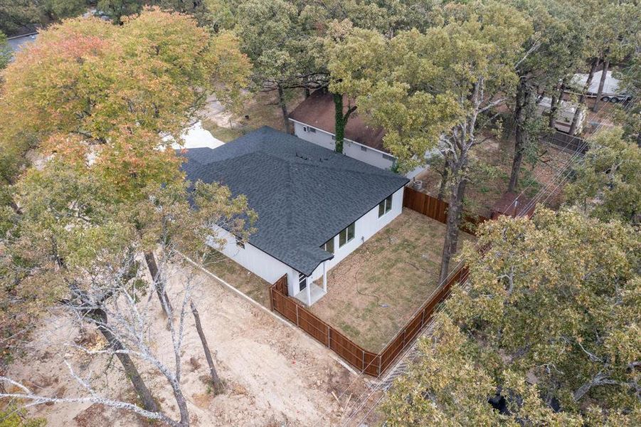View of subject property with a tree filled landscape View of subject property with a tree filled landscape
