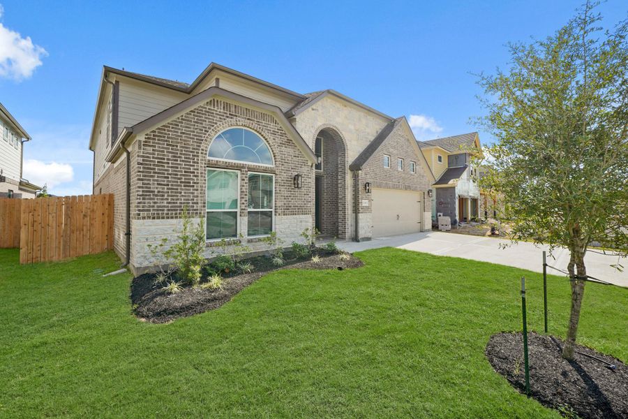 Front exterior of a new home in Morton Creek Ranch, Katy, TX, highlighting curb appeal (Image 16).