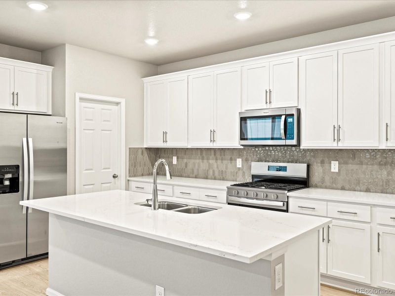 Photos are representative only and are not of the actual home. Actual finishes, elevation, and features may vary.