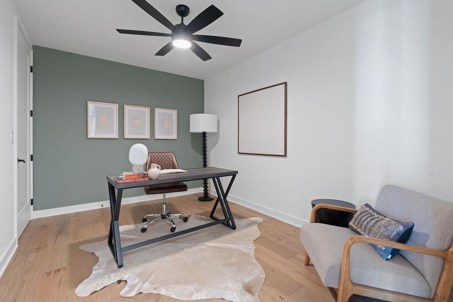 Representative Photo. Secondary Bedroom with wood flooring and ceiling fan.
