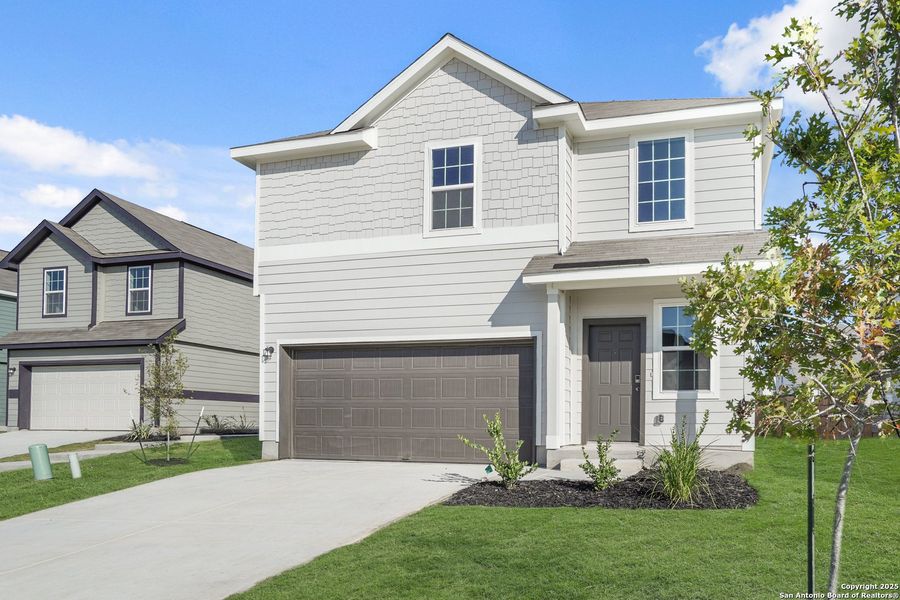 Front exterior of a new home in Applewhite Meadows, San Antonio, TX, highlighting curb appeal (Image 16).