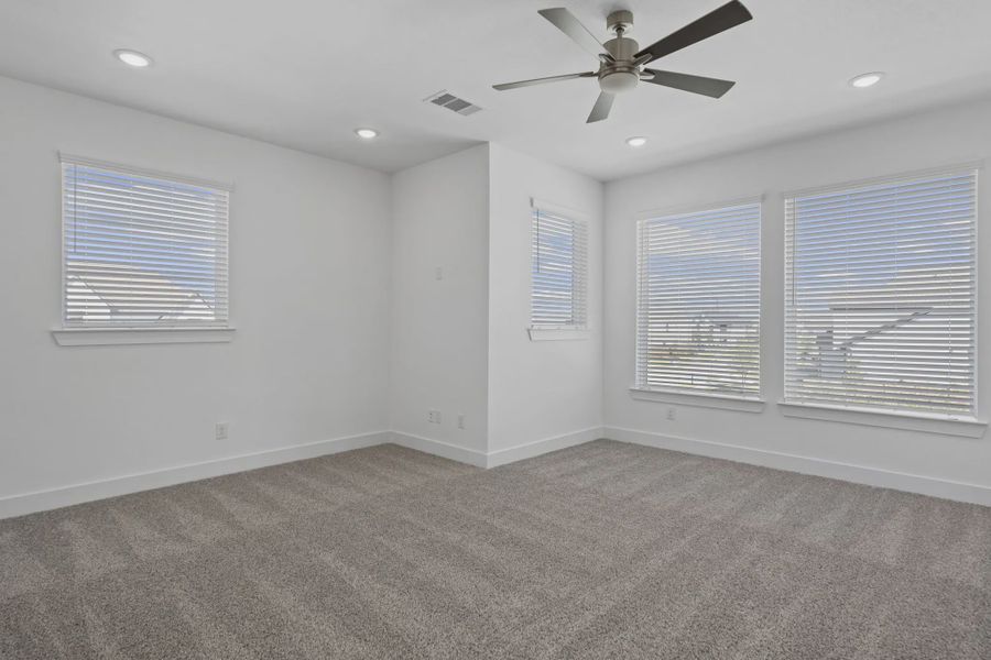 Representative unfurnished interior of a home built from the Waterford by Chesmar Homes in Meridiana 60's, Manvel (Image 36).