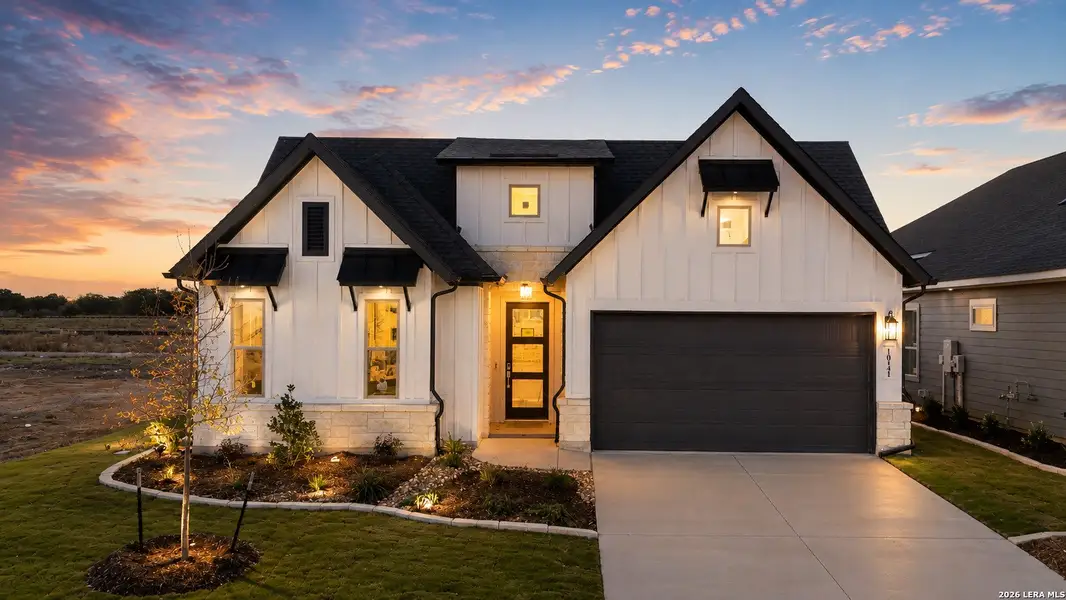 Front exterior of a new home in Davis Ranch, San Antonio, TX, highlighting curb appeal (Image 23). Front exterior of a new home in Davis Ranch, San Antonio, TX, highlighting curb appeal (Image 23).