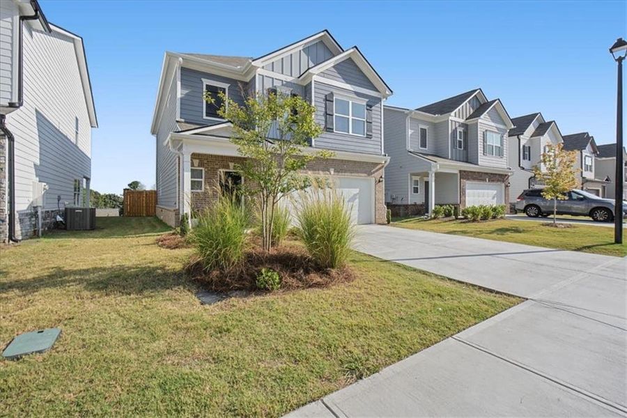 Front exterior of a new home in , Cartersville, GA, highlighting curb appeal (Image 27).