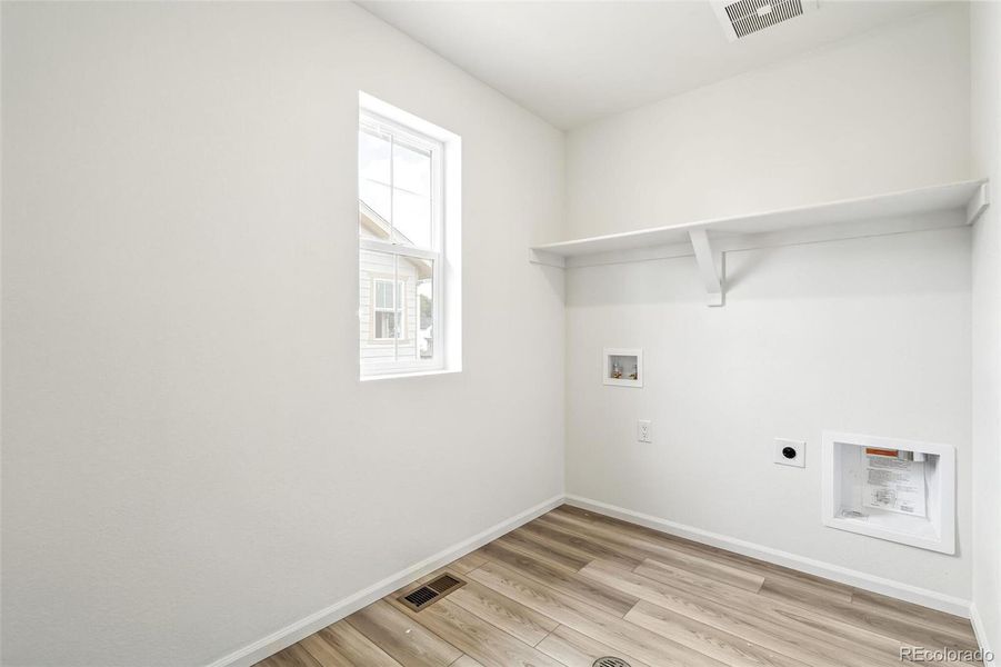 Spacious, unfurnished interior of a new home in Windsong, Thornton (Image 27).