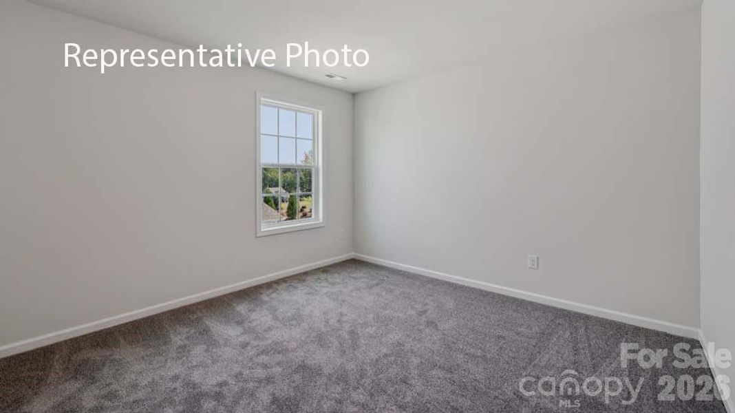 Spacious, unfurnished interior of a new home in Sanctuary at Southgate, Indian Trail (Image 28).