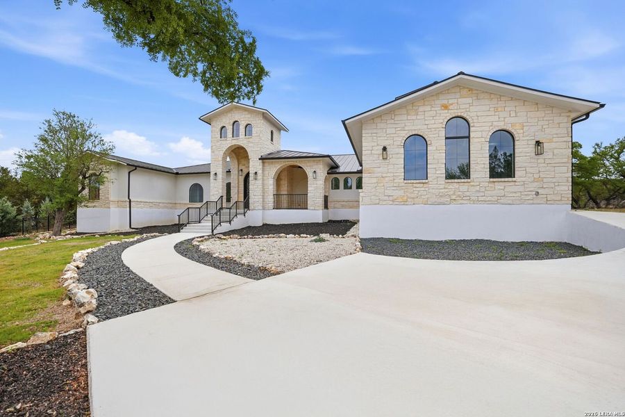 Front exterior of a new home in , New Braunfels, TX, highlighting curb appeal (Image 29).