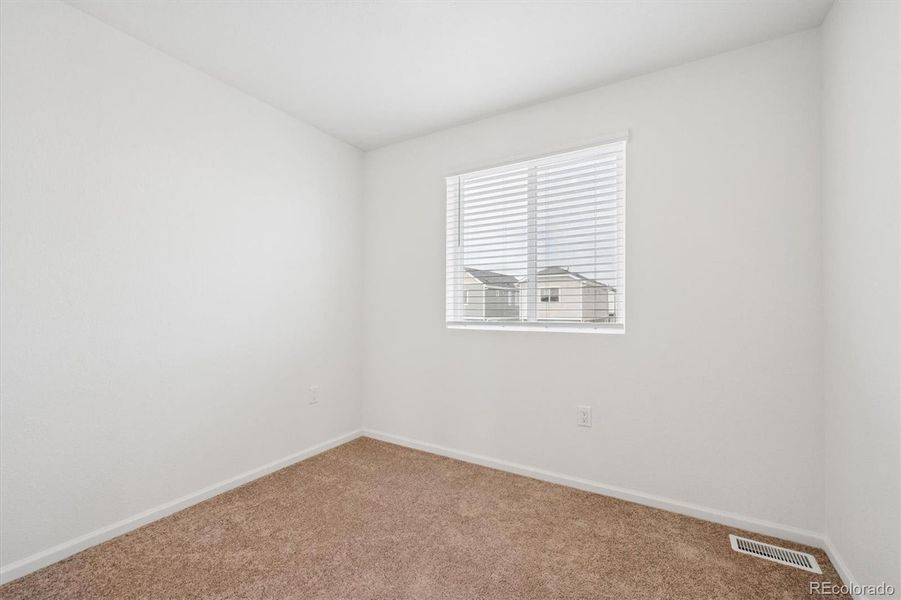 Spacious, unfurnished interior of a new home in Reunion, Commerce City (Image 20).