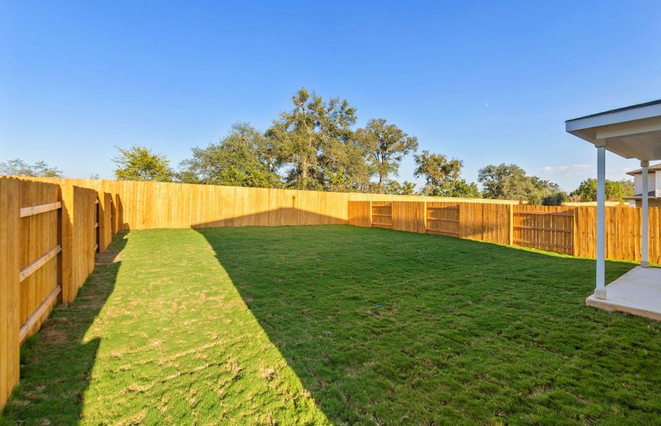 Exterior details and patio area of a home in Woodside, Georgetown (Image 17).