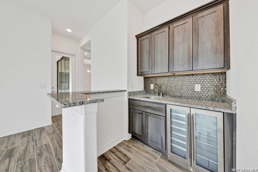 Furnished interior view inside a new home in El Sonido at Campanas, San Antonio (Image 29).