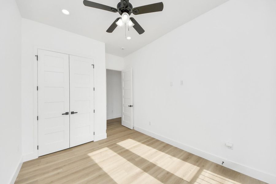 Guest bedroom w/ large closet space. Guest bedroom w/ large closet space.