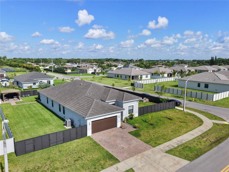 Front exterior of a new home in , Homestead, FL, highlighting curb appeal (Image 23).
