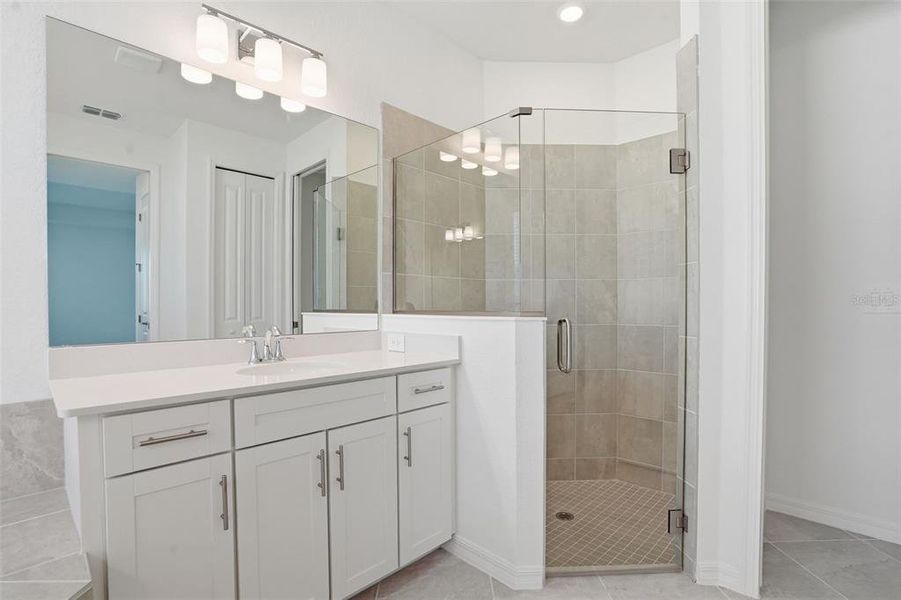 Furnished interior view inside a new home in Wellen Park Golf & Country Club, Venice (Image 13).