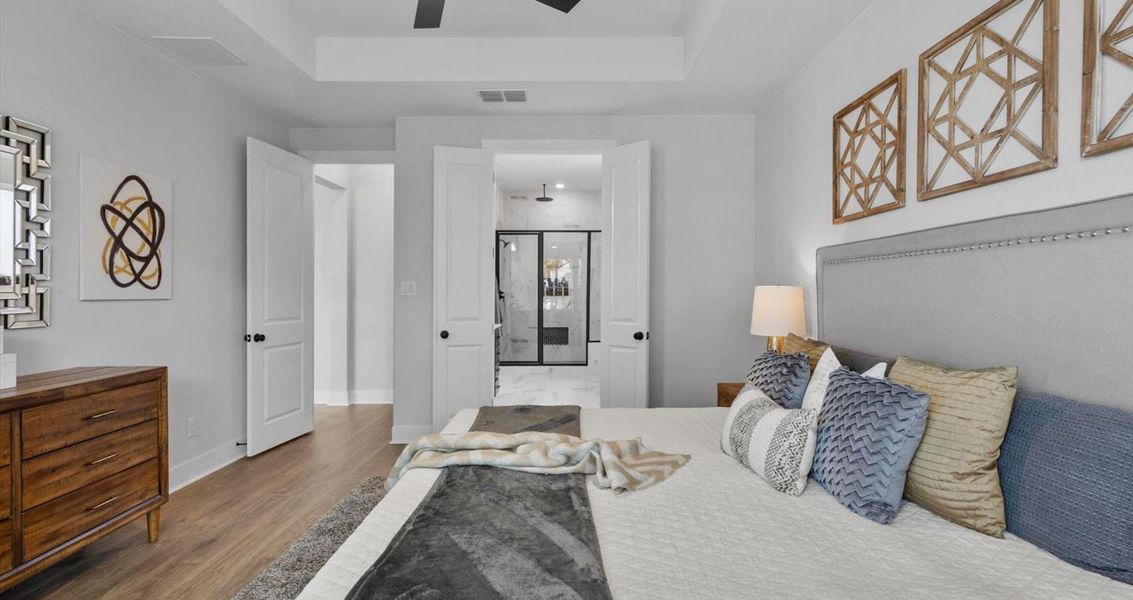 Representative furnished interior of a home built from the Mia by Chesmar Homes in Sunfield, Buda (Image 9).