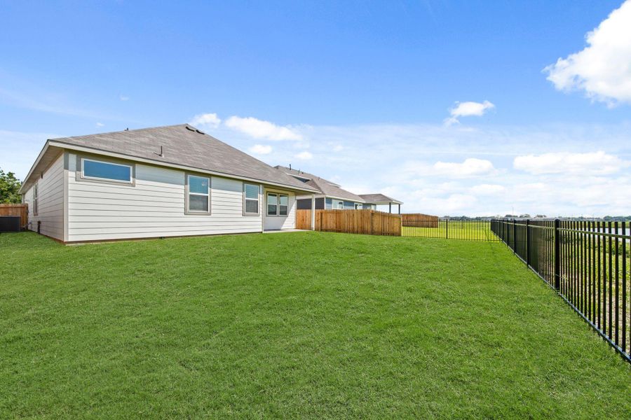 Exterior details and patio area of a home in Russell Ranch, Bay City (Image 16).