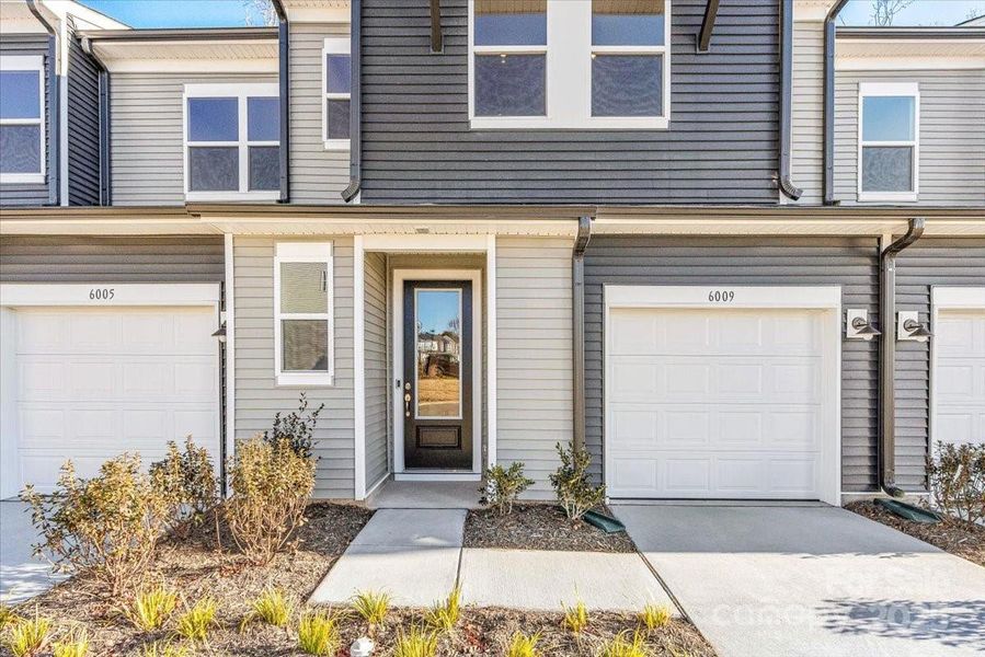 Maintenance Free Landscaping and Covered Front Entry.