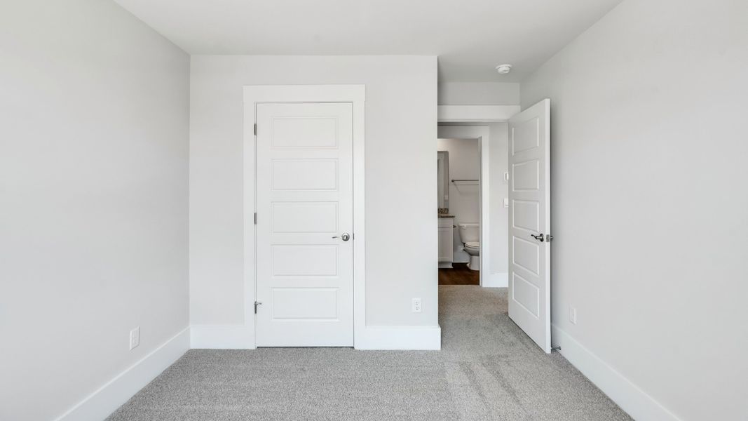 Spacious, unfurnished interior of a new home in The Pines at Blake Farm, Wilmington (Image 27).