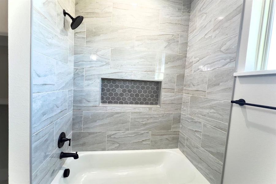 Bathroom with shower / tub combination
