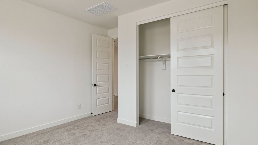 Spacious, unfurnished interior of a new home in The Ridge at Stone Butte, Phoenix (Image 18).