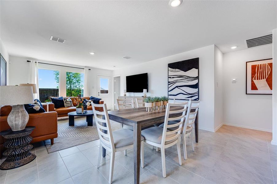 Dining room featuring light tile patterned flooring