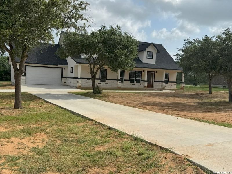 Front exterior of a new home in , Lytle, TX, highlighting curb appeal (Image 19). Front exterior of a new home in , Lytle, TX, highlighting curb appeal (Image 19).