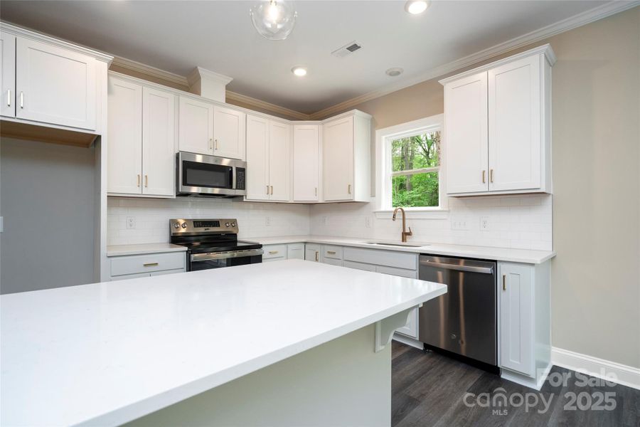 Furnished interior view inside a new home in , Charlotte (Image 7). Furnished interior view inside a new home in , Charlotte (Image 7).