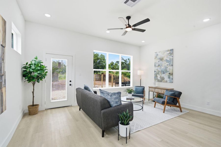 The cozy living room offers plenty of space for relaxing.