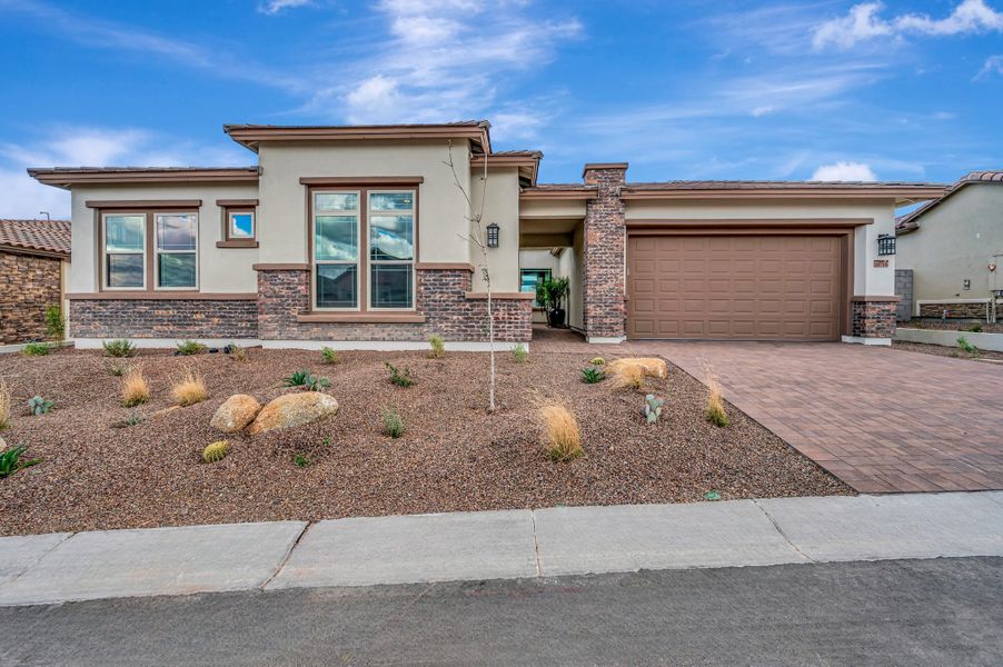 Front exterior of a new home in The Ridge at Victory, Buckeye, AZ, highlighting curb appeal (Image 2).