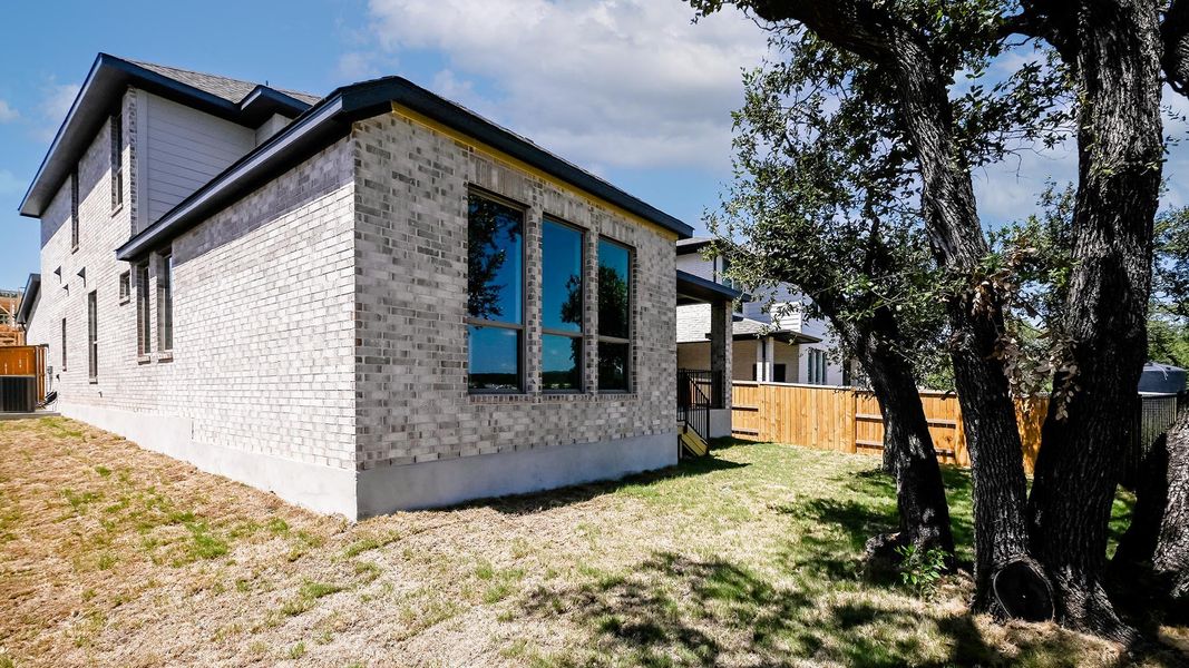 Exterior details and patio area of a home in 6 Creeks, Kyle (Image 3).