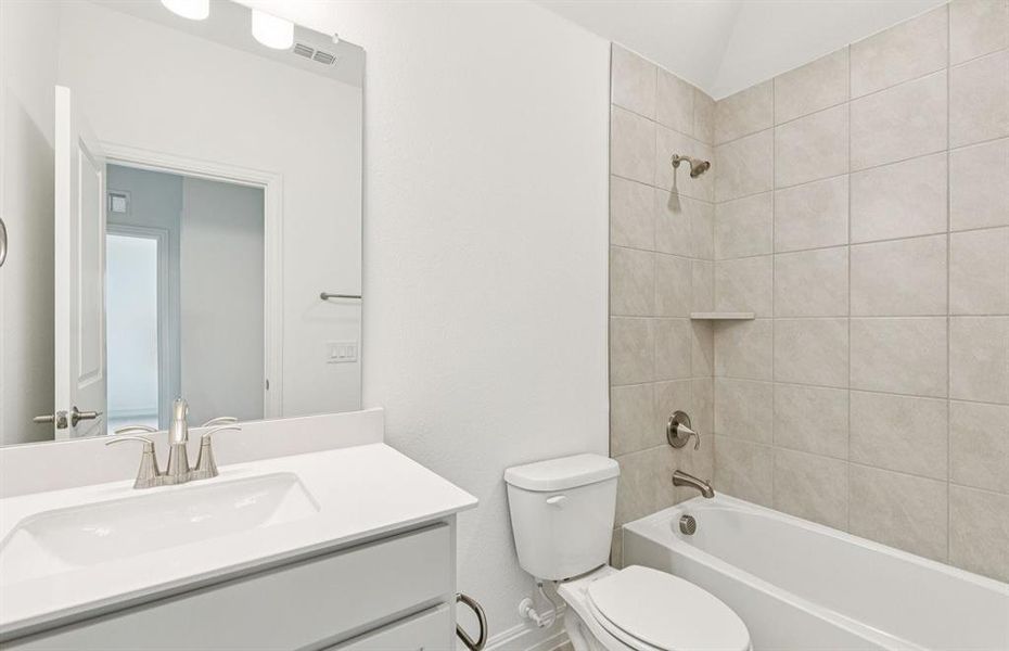 Upgraded secondary bath with elegant finishes  *Real home pictured