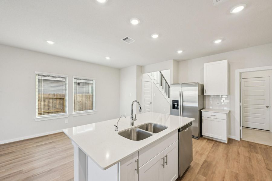 Furnished interior view inside a new home in Landing Meadows - Traditional Series, New Caney (Image 6). Furnished interior view inside a new home in Landing Meadows - Traditional Series, New Caney (Image 6).