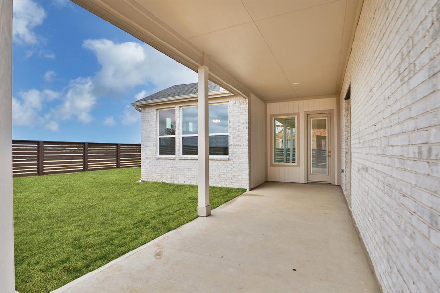 Exterior details and patio area of a home in Bridgeland Central, Cypress (Image 22).