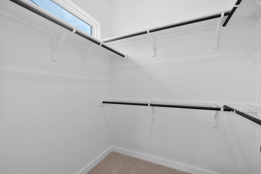 Walk-in closet in Primary Bedroom