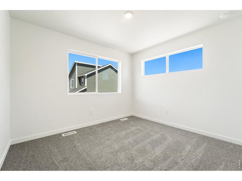 Spacious, unfurnished interior of a new home in Liberty Draw, Evans (Image 11).