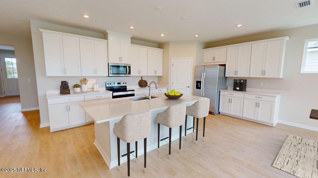 Furnished interior view inside a new home in Lakes at Bella Lago, Green Cove Springs (Image 6).