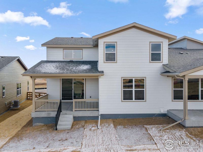 Exterior details and patio area of a home in Cordovan, Longmont (Image 4).