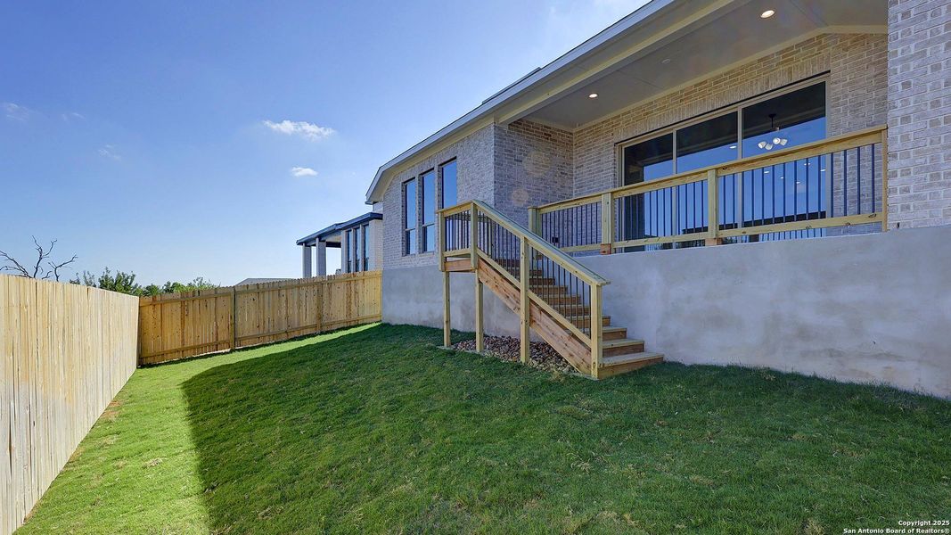Exterior details and patio area of a home in Ladera 50', San Antonio (Image 31).