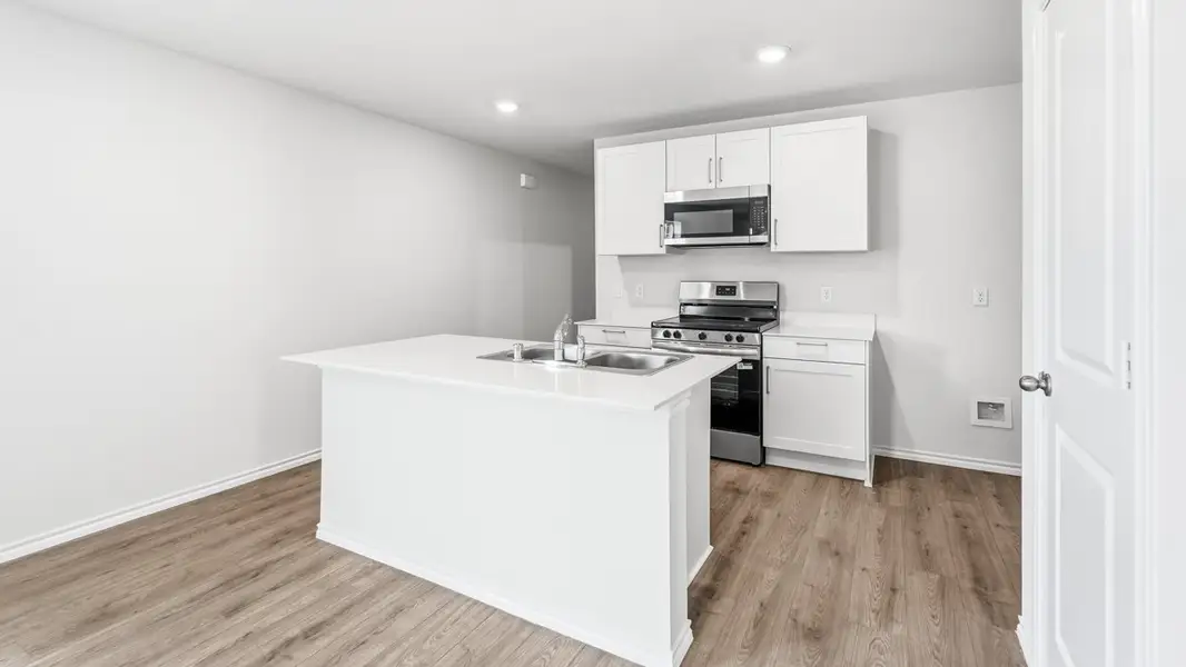 Representative furnished interior of a home built from the Caprock by D.R. Horton in Asher Oaks, Bonham (Image 4).