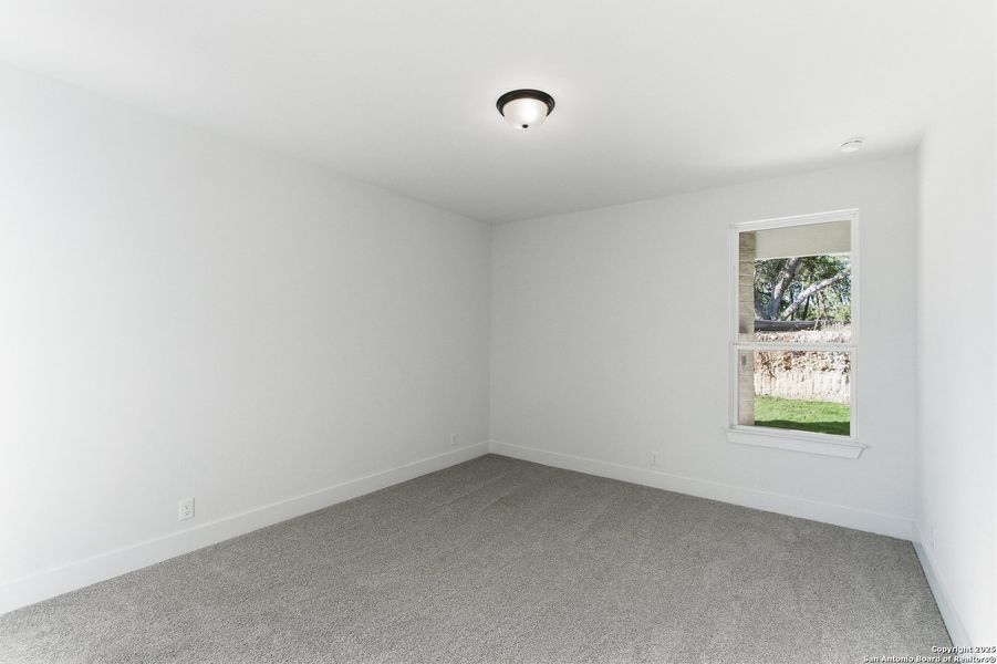 Spacious, unfurnished interior of a new home in Caliza Reserve, Boerne (Image 32).