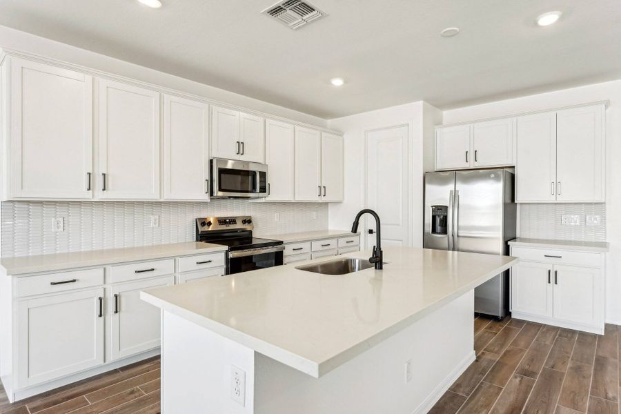 Kitchen. Finishes vary by community