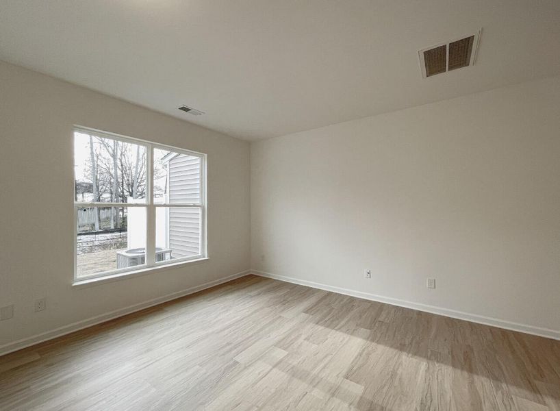 Spacious, unfurnished interior of a new home in East Main Townes, Spartanburg (Image 15).