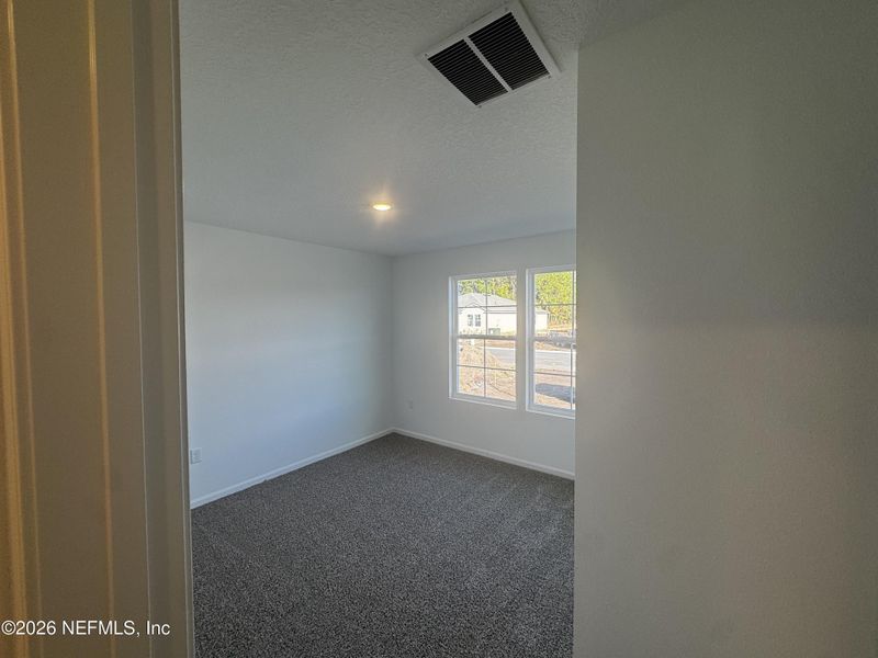Spacious, unfurnished interior of a new home in The Arbors, Jacksonville (Image 22).