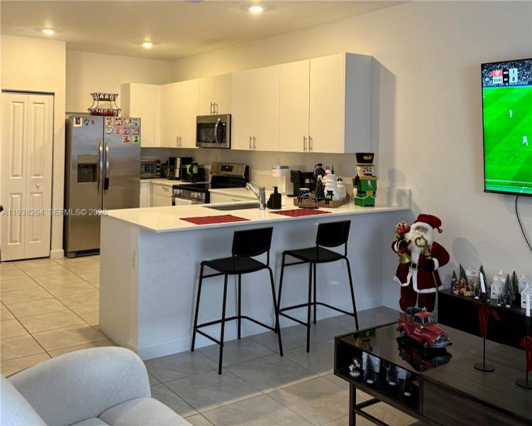 Furnished interior view inside a new home in , Miami (Image 7).