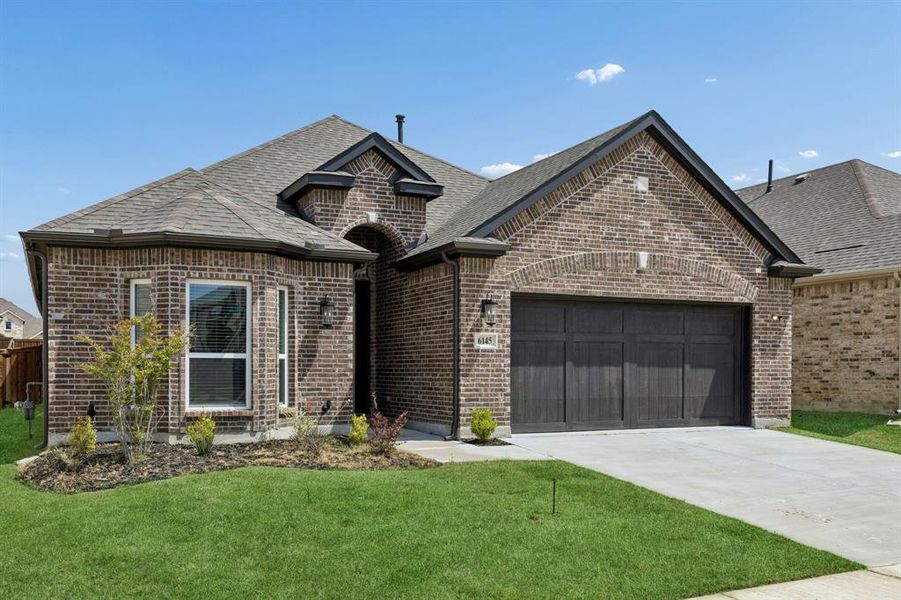 Front exterior of a new home in , Celina, TX, highlighting curb appeal (Image 25).