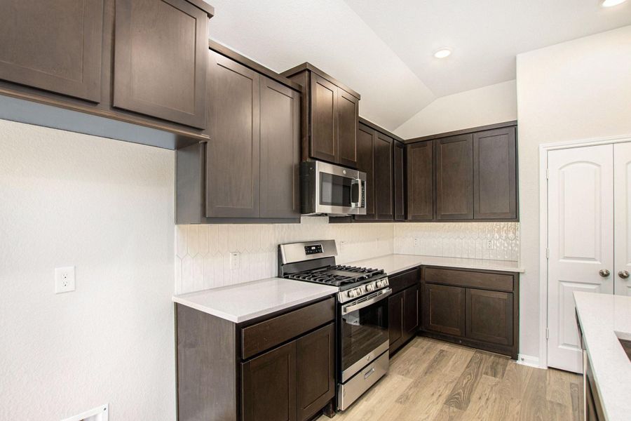 Furnished interior view inside a new home in , Bay City (Image 6). Furnished interior view inside a new home in , Bay City (Image 6).