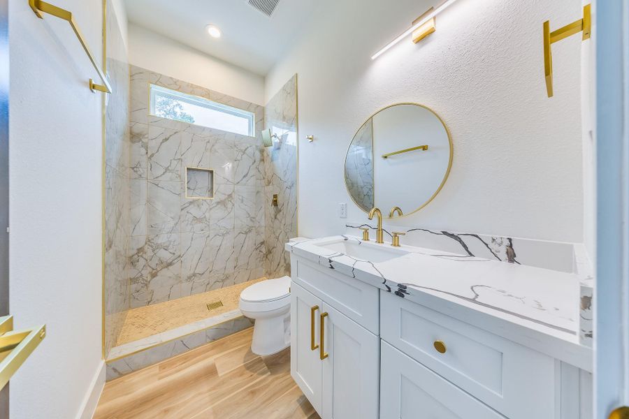 All bathrooms feature beautiful quartz countertops, offering a sleek, durable, and elegant surface for a modern, luxurious finish. All bathrooms feature beautiful quartz countertops, offering a sleek, durable, and elegant surface for a modern, luxurious finish.